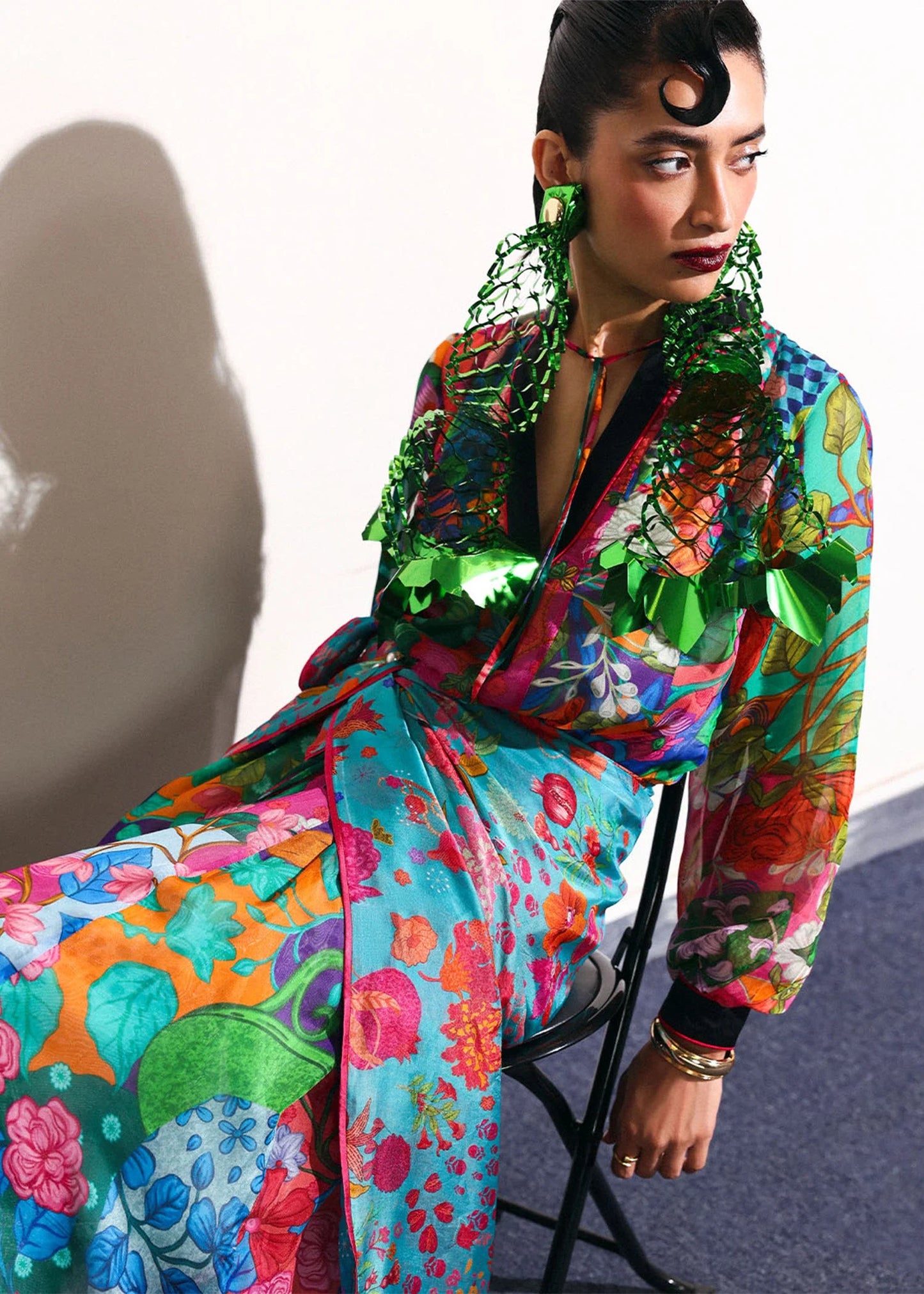 Model wearing multicolor floral Claret outfit with polka dot trousers from Hussain Rehar, ideal for Pakistani luxury pret in UK.