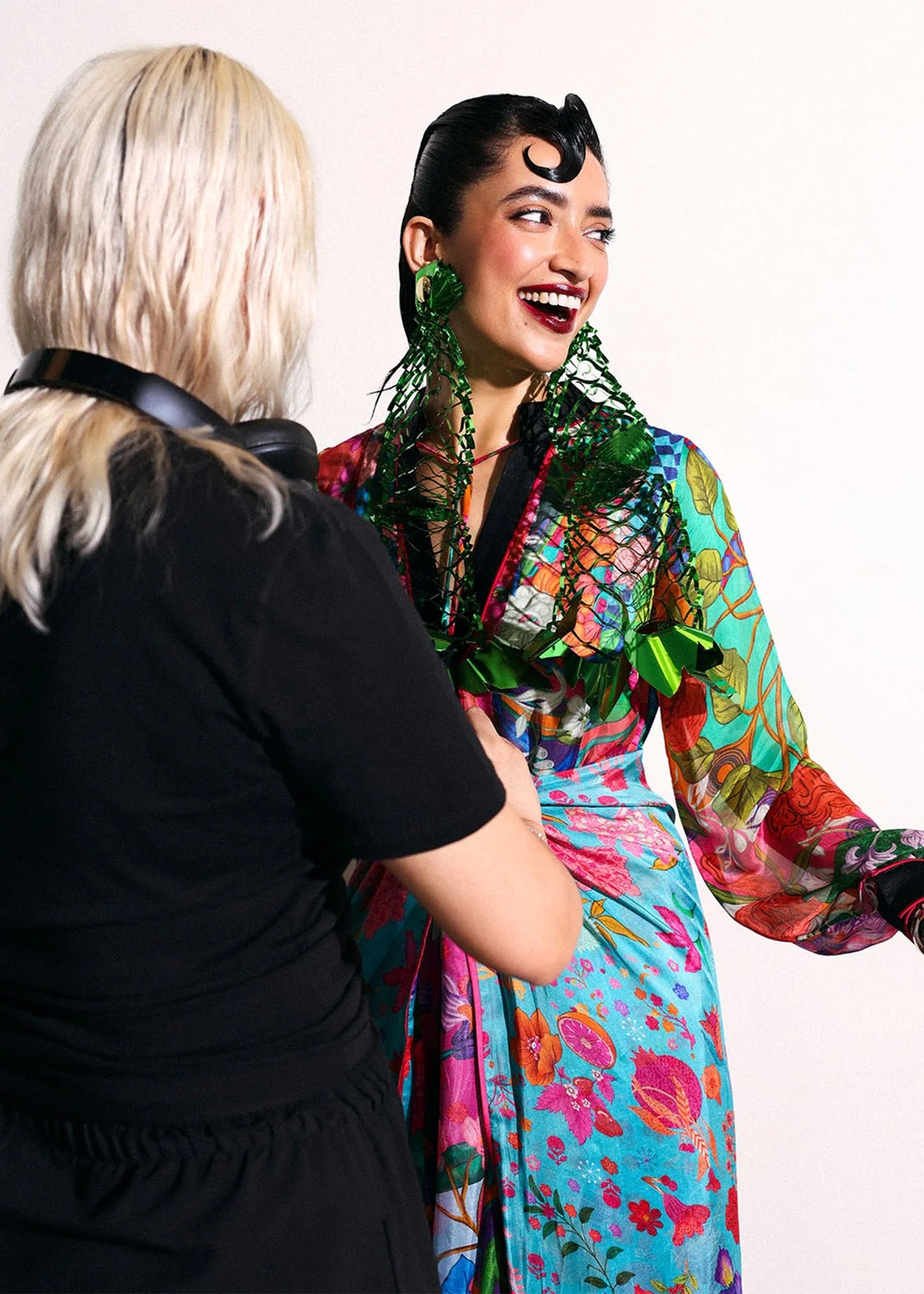 Model wearing multicolor floral Claret outfit with polka dot trousers from Hussain Rehar, ideal for Pakistani luxury pret in UK.