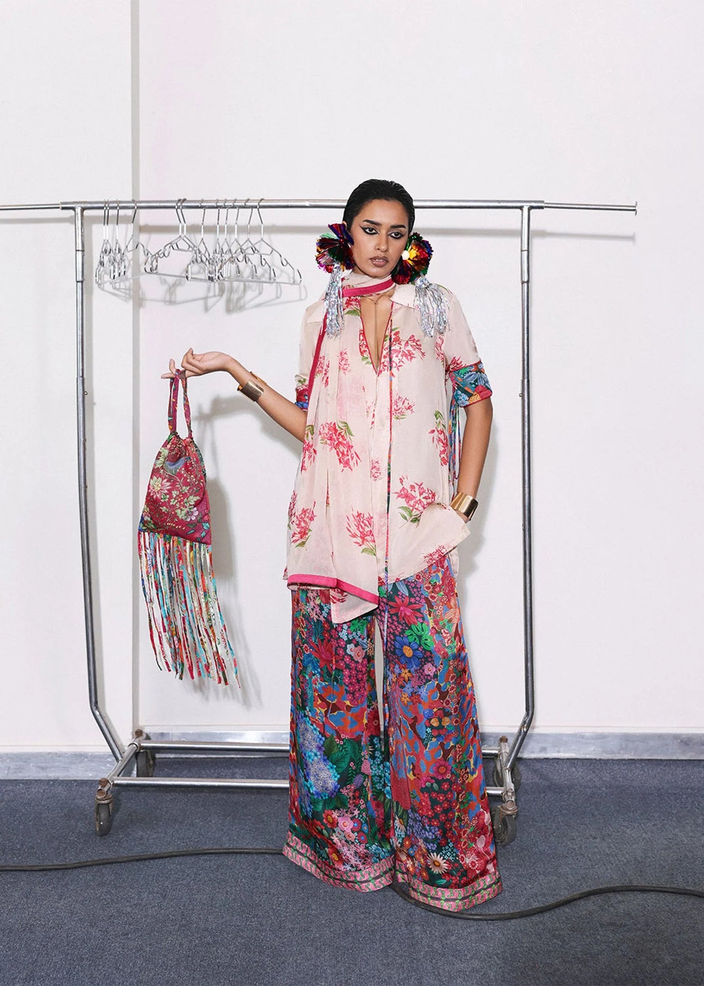 Model wearing blush pink and multicolor floral outfit from Hussain Rehar, perfect for Pakistani luxury pret and clothes online in UK.
