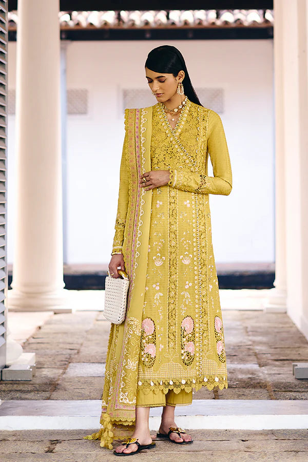 Model wearing mustard yellow embroidered dress from Suffuse Casual Pret 2025 Zorah. Pakistani luxury pret and Pakistani clothes online in UK.
