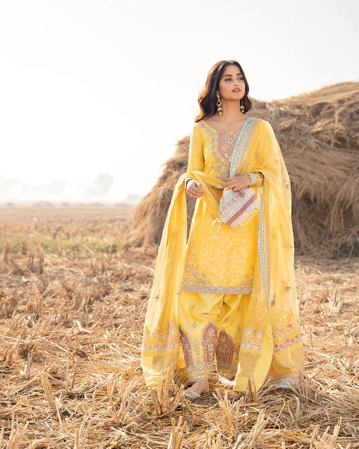 model wearing yellow dress by Faiza Saqlain, Pakistani luxury pret ideal for online shopping in the UK