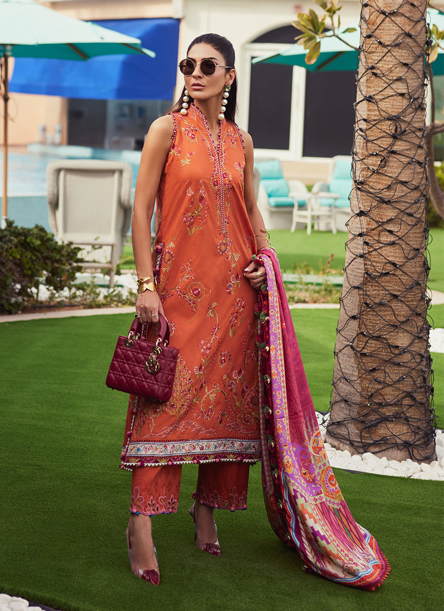 Model wearing rust orange embroidered outfit from Farah Talib Aziz, Unstitched Luxury '25, ideal for Pakistani clothes online in UK.