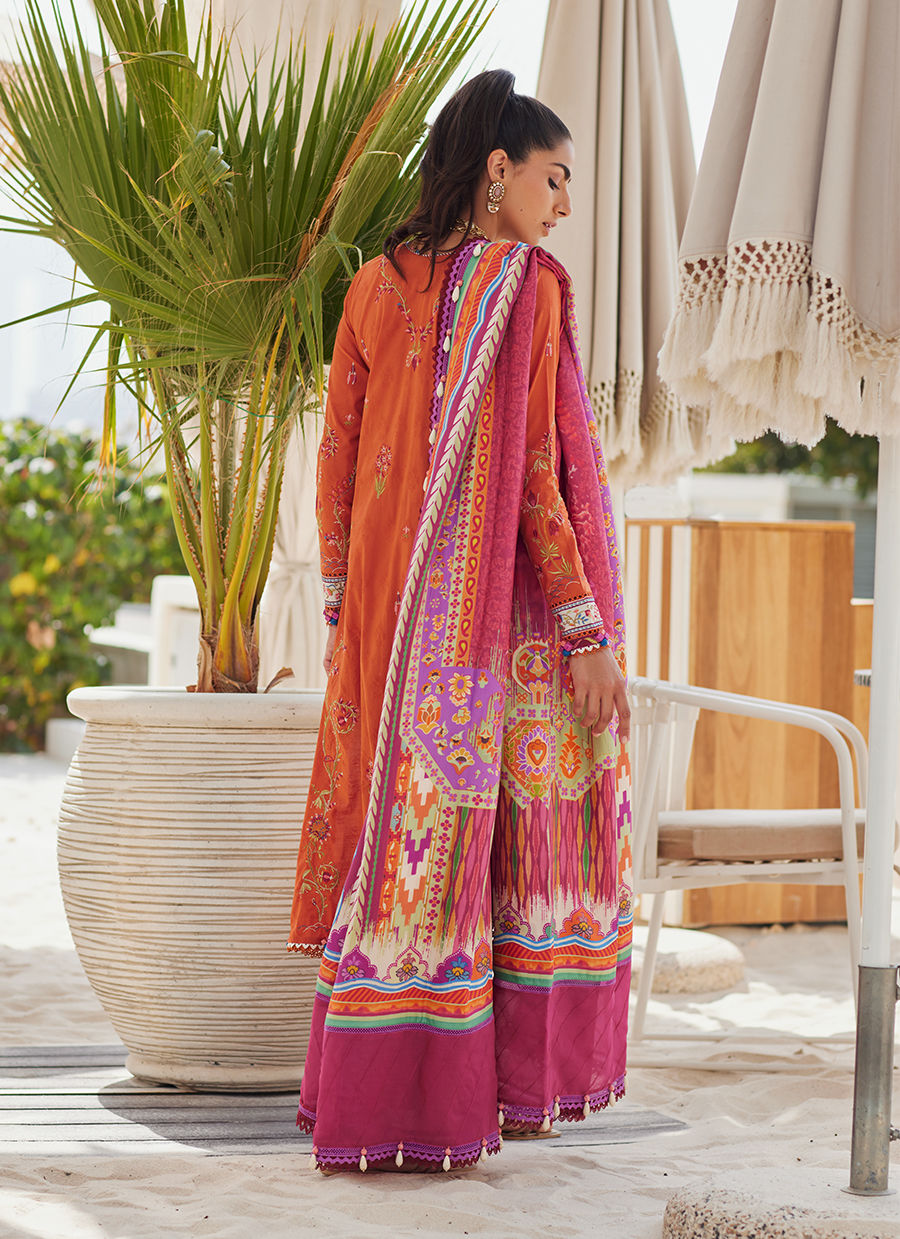 Model wearing rust orange embroidered outfit from Farah Talib Aziz, Unstitched Luxury '25, ideal for Pakistani clothes online in UK.