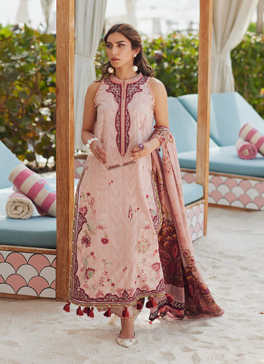 Model wearing tea pink embroidered dress with tassel detailing from Farah Talib Aziz Pricsilla, Pakistani Luxury pret in UK.