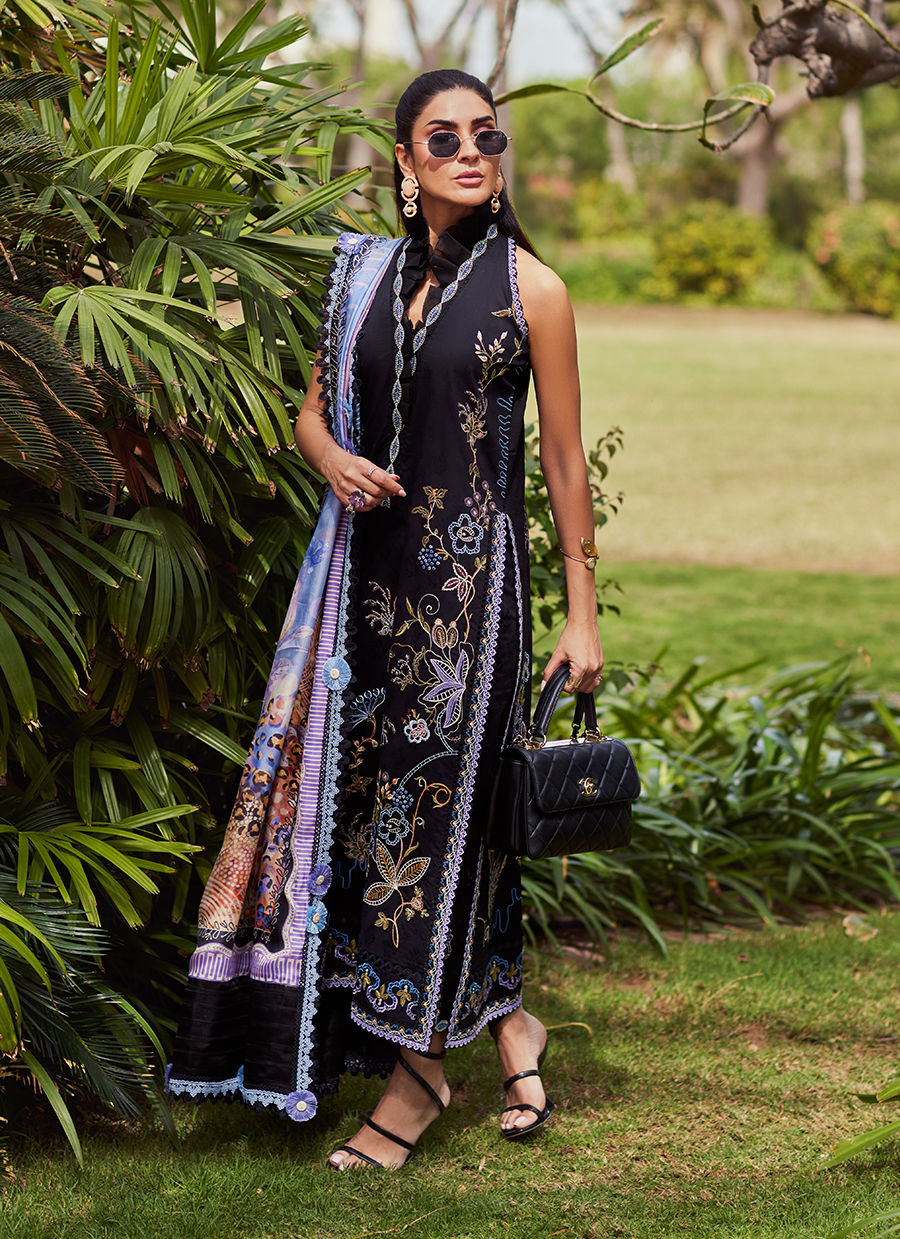 Model wearing Farah Talib Aziz Belle Black luxury unstitched dress with intricate embroidery. Shop Pakistani luxury pret online in the UK.