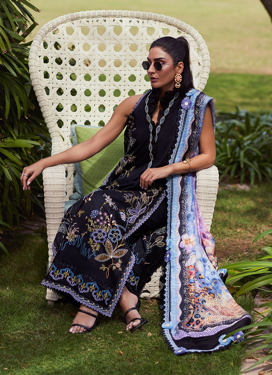 Model wearing Farah Talib Aziz Belle Black luxury unstitched dress with intricate embroidery. Shop Pakistani luxury pret online in the UK.