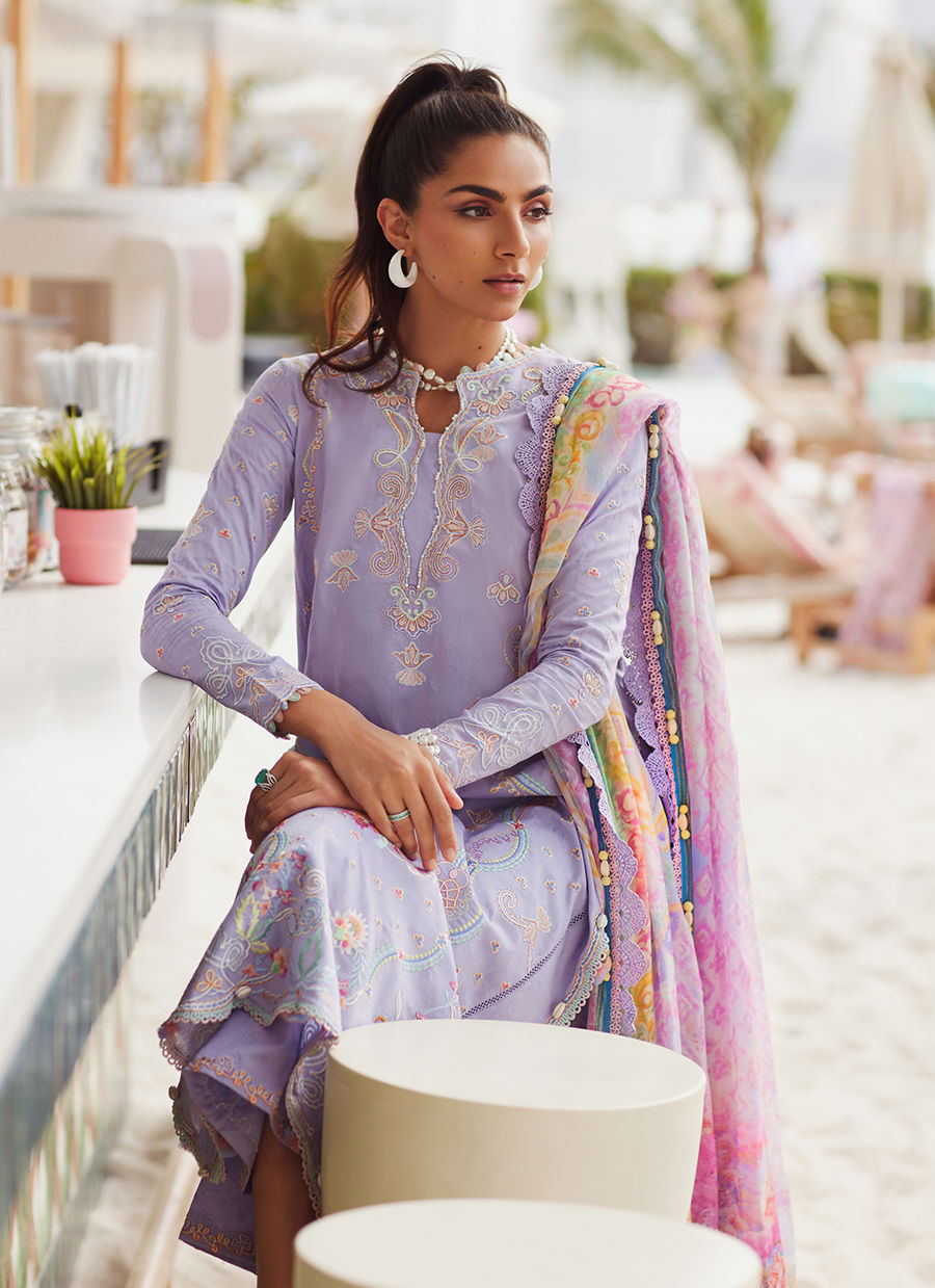 Model wearing lavender embroidered dress with printed dupatta from Farah Talib Aziz Liliana, Pakistani Luxury pret online in UK.