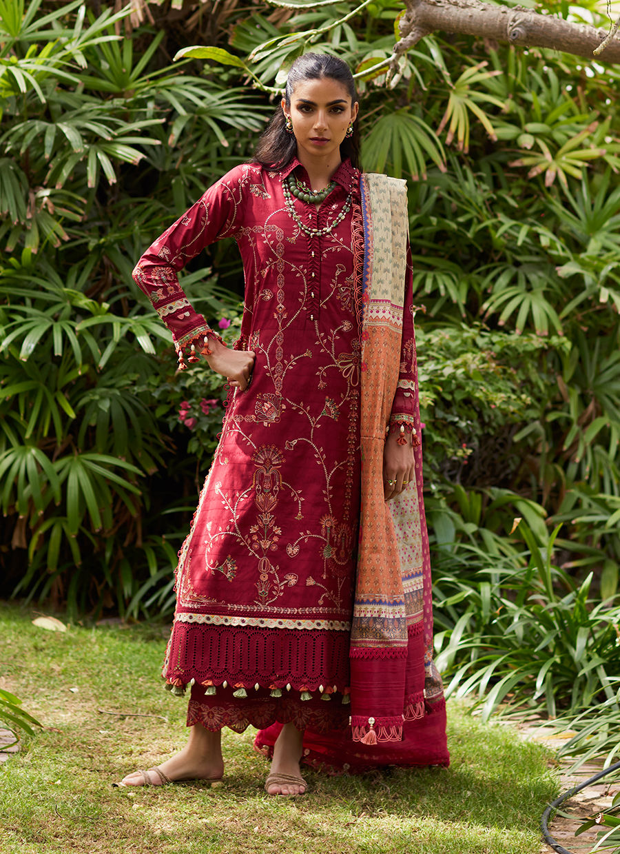 Model wearing Farah Talib Aziz Rosemary Red luxury unstitched dress with intricate embroidery. Shop Pakistani luxury pret online in the UK.