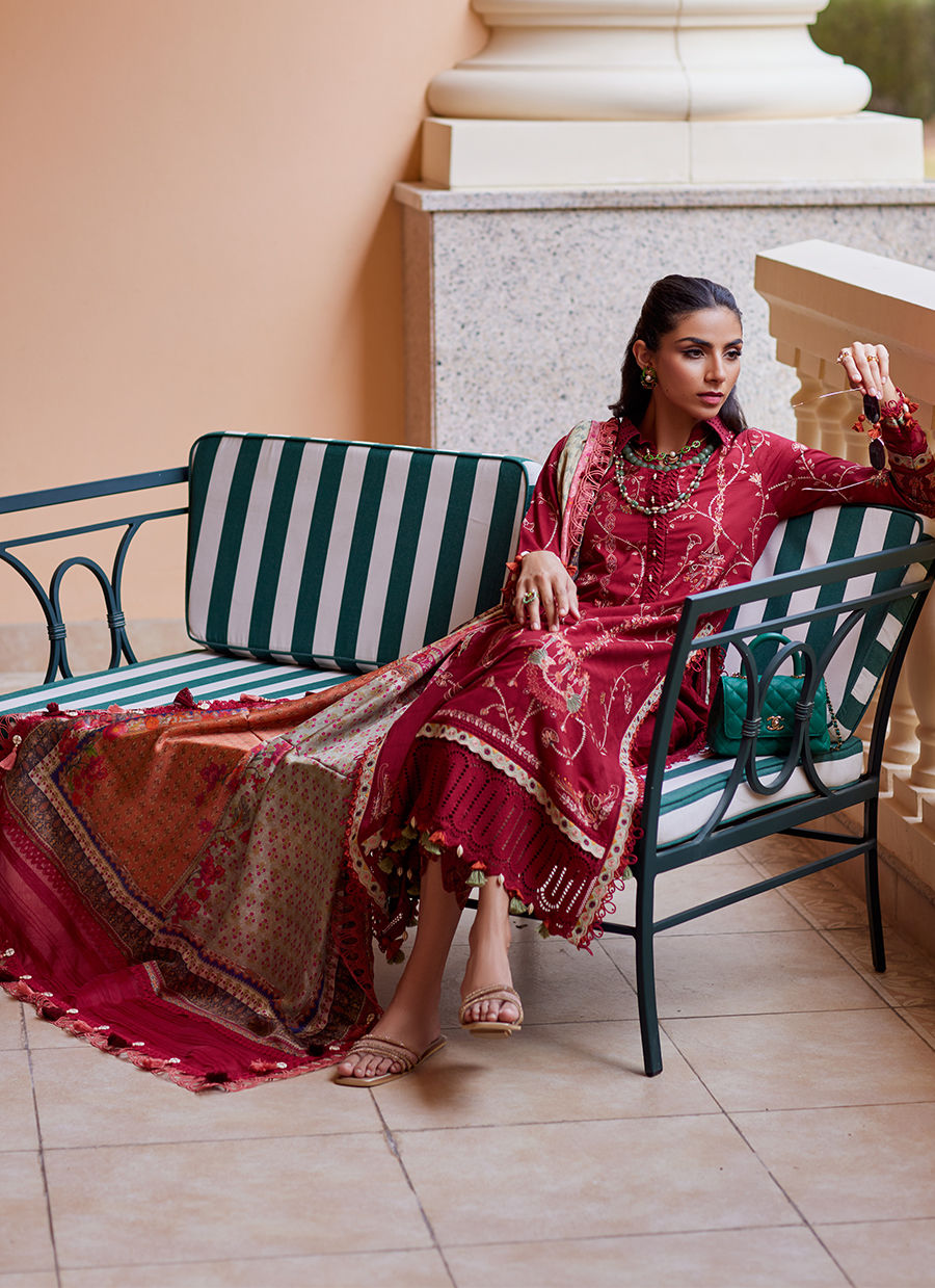 Model wearing Farah Talib Aziz Rosemary Red luxury unstitched dress with intricate embroidery. Shop Pakistani luxury pret online in the UK.