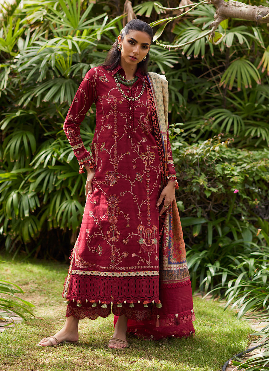 Model wearing Farah Talib Aziz Rosemary Red luxury unstitched dress with intricate embroidery. Shop Pakistani luxury pret online in the UK.