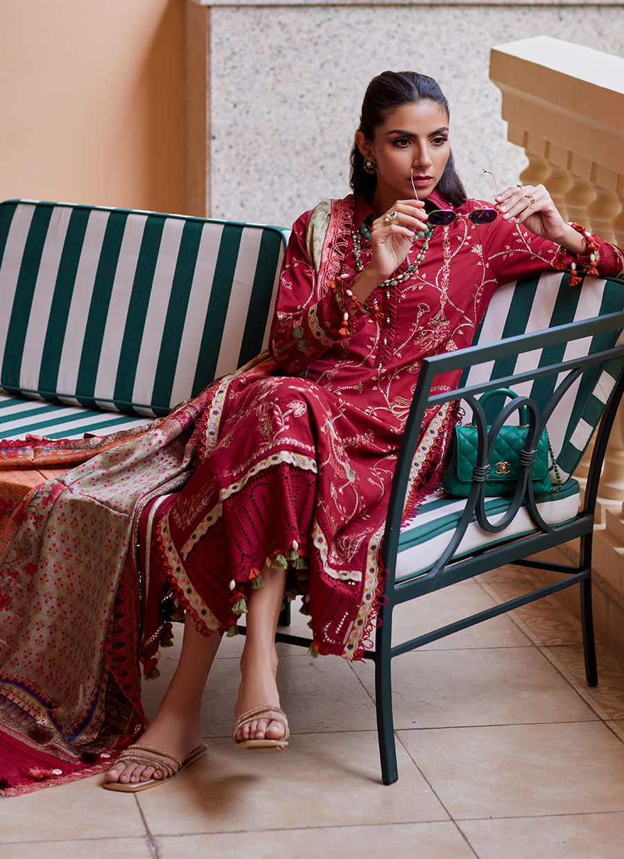 Model wearing Farah Talib Aziz Rosemary Red luxury unstitched dress with intricate embroidery. Shop Pakistani luxury pret online in the UK.