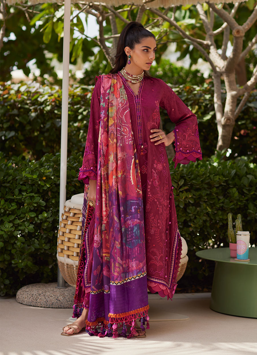 Model wearing deep berry and purple embroidered outfit from Farah Talib Aziz, Unstitched Luxury '25, ideal for Pakistani clothes online in UK.