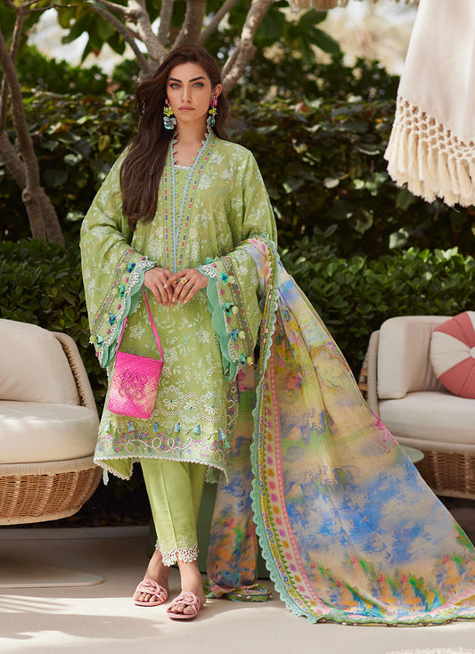 Model wearing pastel kiwi green embroidered outfit from Farah Talib Aziz, Unstitched Luxury '25, perfect for Pakistani clothes online in UK.