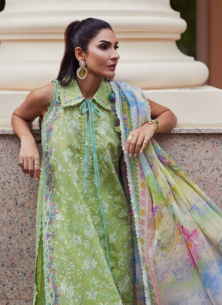 Model wearing pastel kiwi green embroidered outfit from Farah Talib Aziz, Unstitched Luxury '25, perfect for Pakistani clothes online in UK.