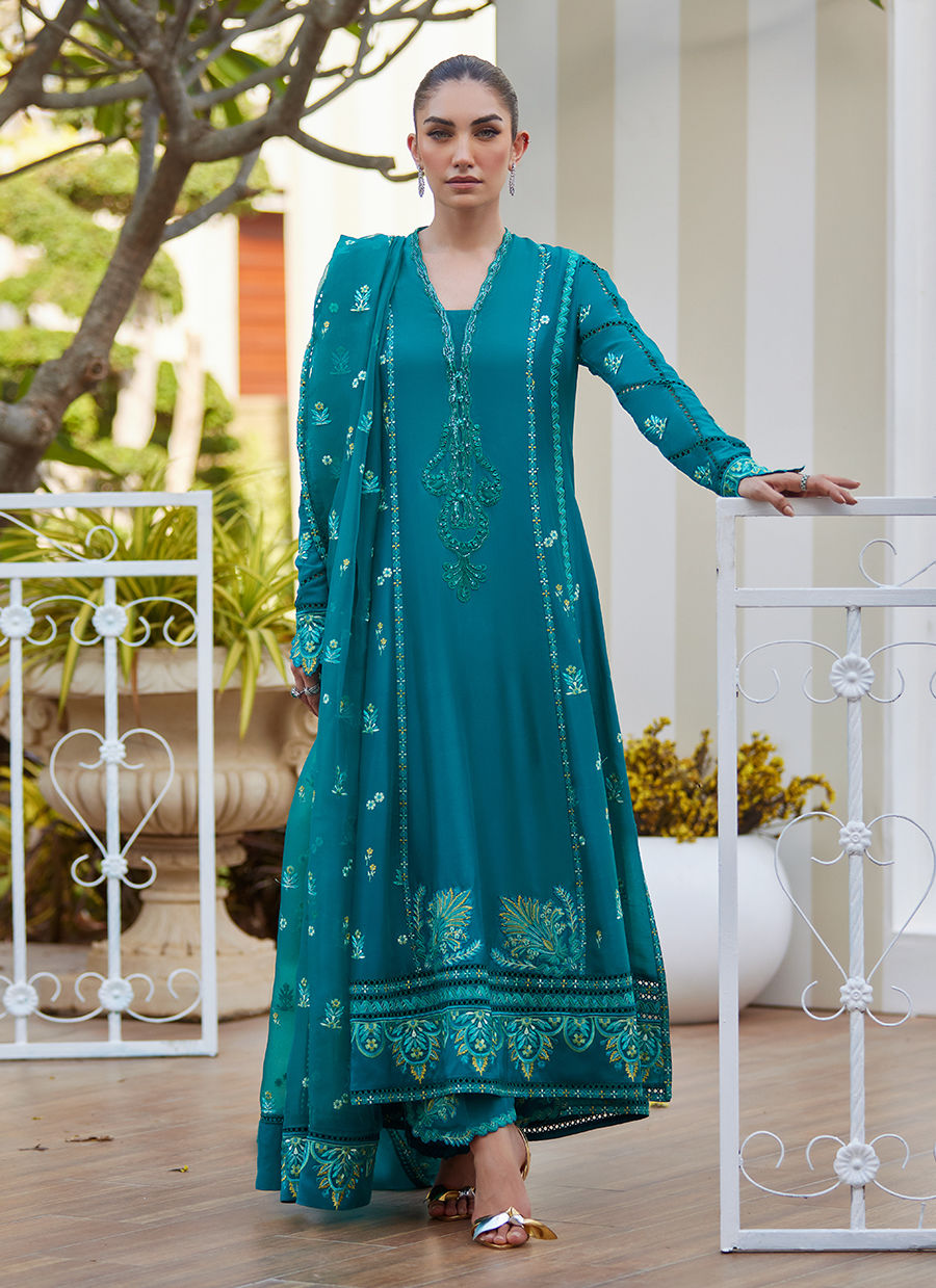 Model wearing emerald green embroidered outfit from Farah Talib Aziz, ideal for Pakistani luxury pret and Pakistani clothes online in UK.