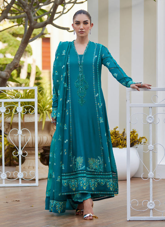 Model wearing emerald green embroidered outfit from Farah Talib Aziz, ideal for Pakistani luxury pret and Pakistani clothes online in UK.