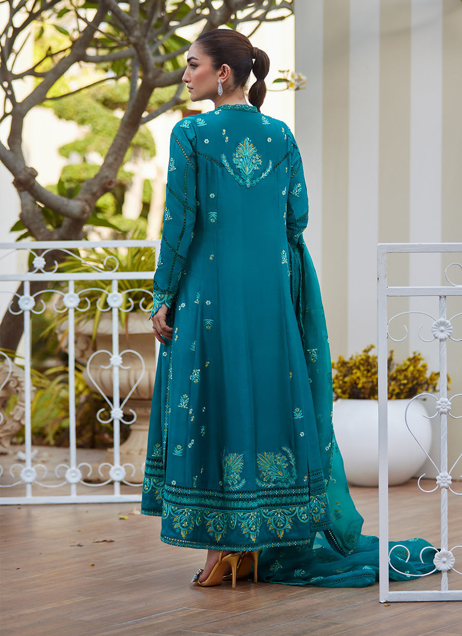 Model wearing emerald green embroidered outfit from Farah Talib Aziz, ideal for Pakistani luxury pret and Pakistani clothes online in UK.