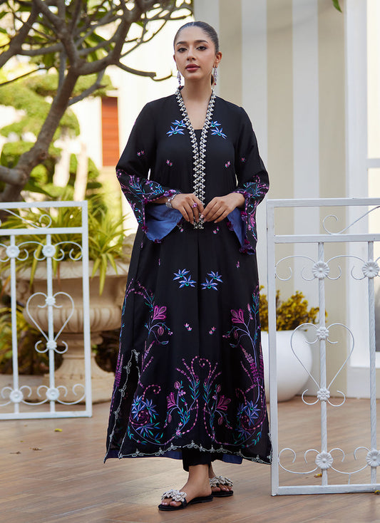 Model wearing black embroidered Zyla Midnight outfit from Farah Talib Aziz, perfect for Pakistani luxury pret and Pakistani clothes online in UK.