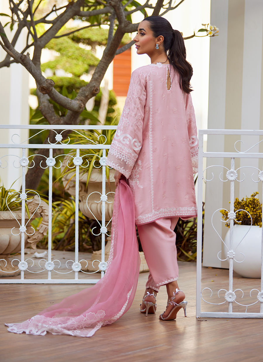 Model wearing tea pink Jovie outfit from Farah Talib Aziz, perfect for Pakistani luxury pret and Pakistani clothes online in UK.