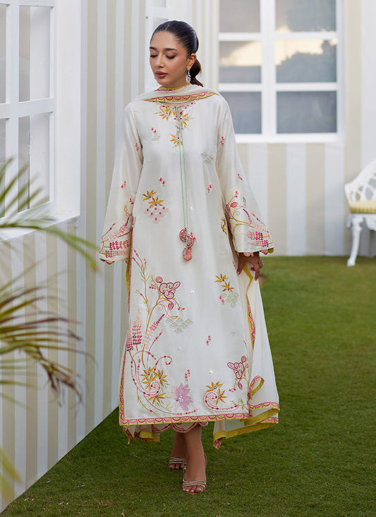 Model wearing ivory Mireza outfit from Farah Talib Aziz, featuring pastel embroidery, perfect for Pakistani luxury pret and clothes online in UK.