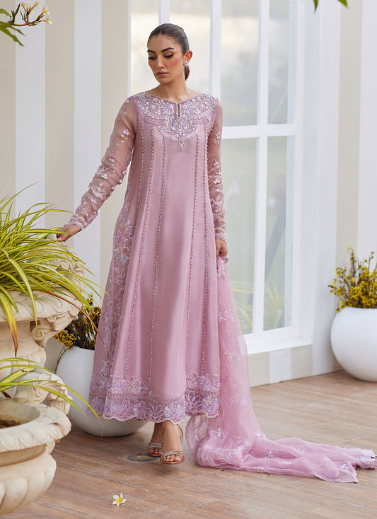 Model wearing mauve Karis dress from Farah Talib Aziz, ideal for Pakistani luxury pret and Pakistani clothes online in UK.