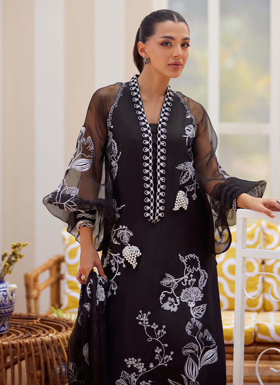 Model wearing black embroidered Reina Ebony outfit from Farah Talib Aziz Tara Luxe II, perfect for Pakistani luxury pret clothes online in UK.