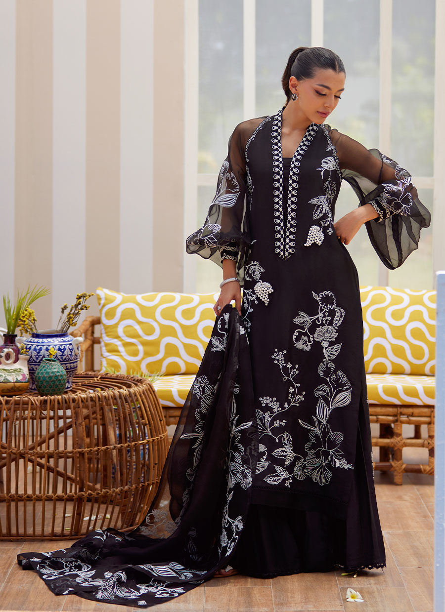 Model wearing black embroidered Reina Ebony outfit from Farah Talib Aziz Tara Luxe II, perfect for Pakistani luxury pret clothes online in UK.