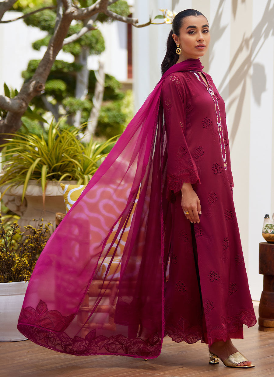 Model wearing burgundy embroidered dress with dupatta from Farah Talib Aziz, ideal for Pakistani luxury pret and festive wear in the UK.