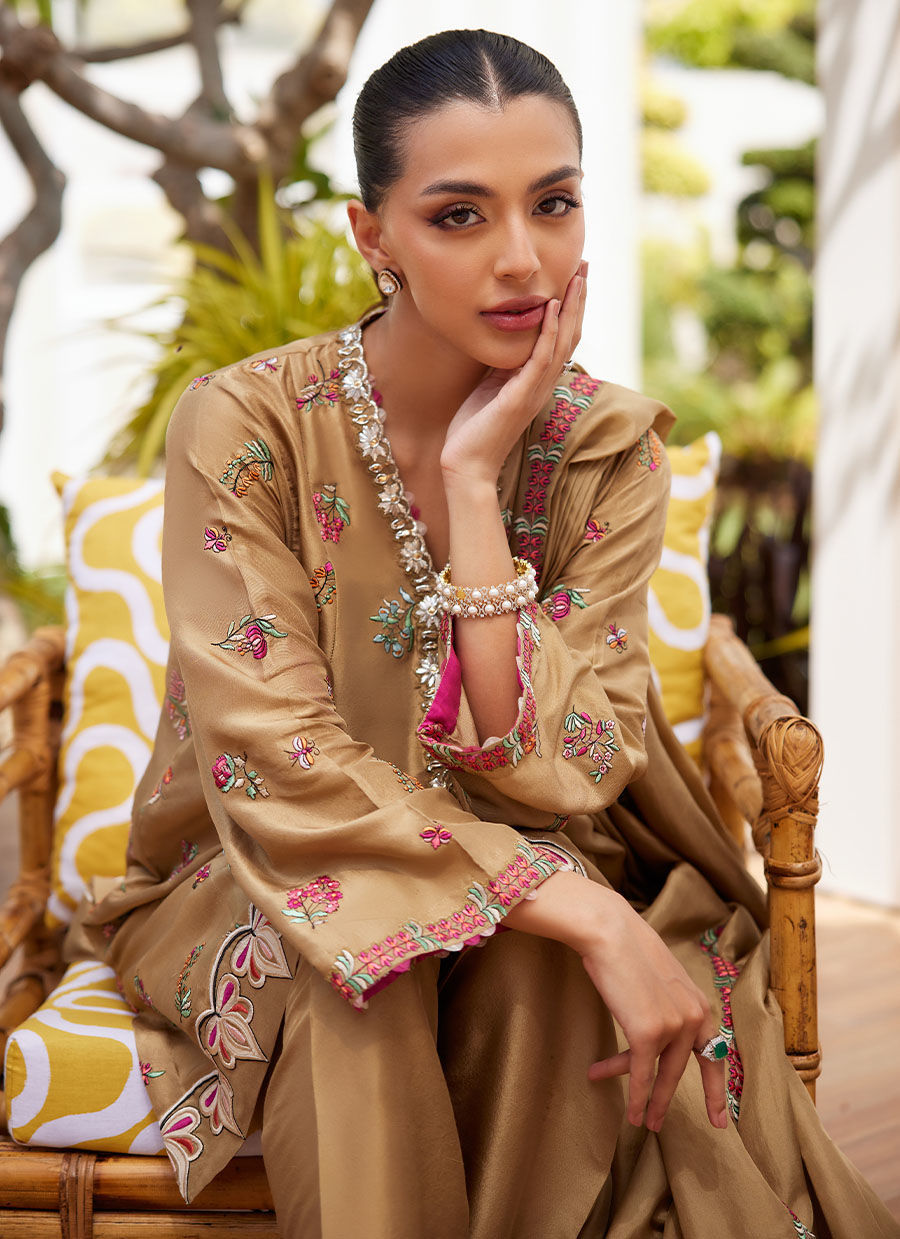 Model wearing beige embroidered dress with dupatta from Farah Talib Aziz, perfect for Pakistani luxury pret and Eid outfits in the UK.