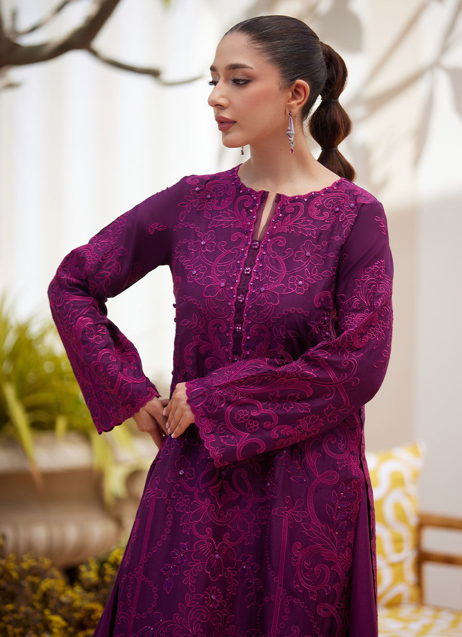 Model wearing plum embroidered dress with matching dupatta from Farah Talib Aziz, ideal for Pakistani luxury pret and Eid wear in the UK.
