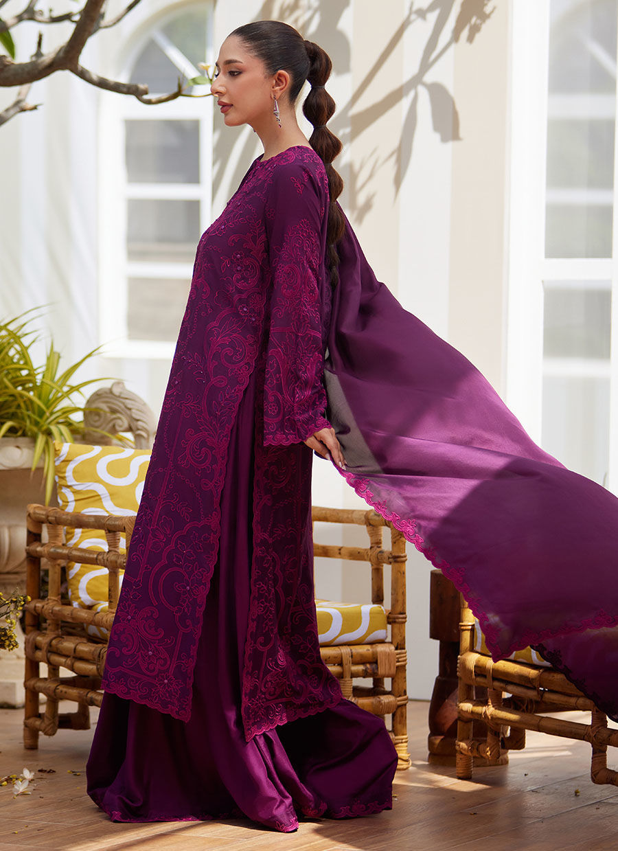 Model wearing plum embroidered dress with matching dupatta from Farah Talib Aziz, ideal for Pakistani luxury pret and Eid wear in the UK.