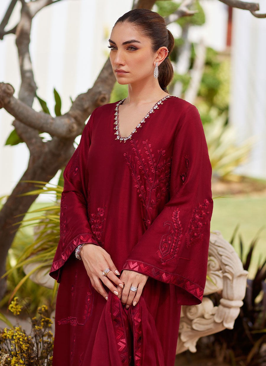 Model wearing scarlett red embroidered dress with matching dupatta from Farah Talib Aziz, perfect for Pakistani luxury pret in the UK.