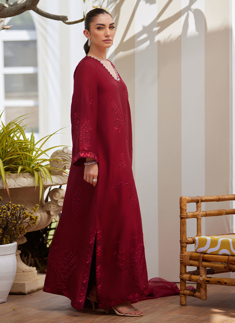 Model wearing scarlett red embroidered dress with matching dupatta from Farah Talib Aziz, perfect for Pakistani luxury pret in the UK.