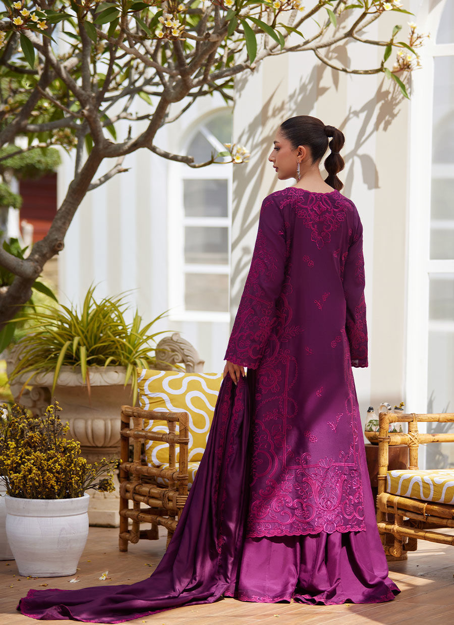 Model wearing plum embroidered dress with matching dupatta from Farah Talib Aziz, ideal for Pakistani luxury pret and Eid wear in the UK.