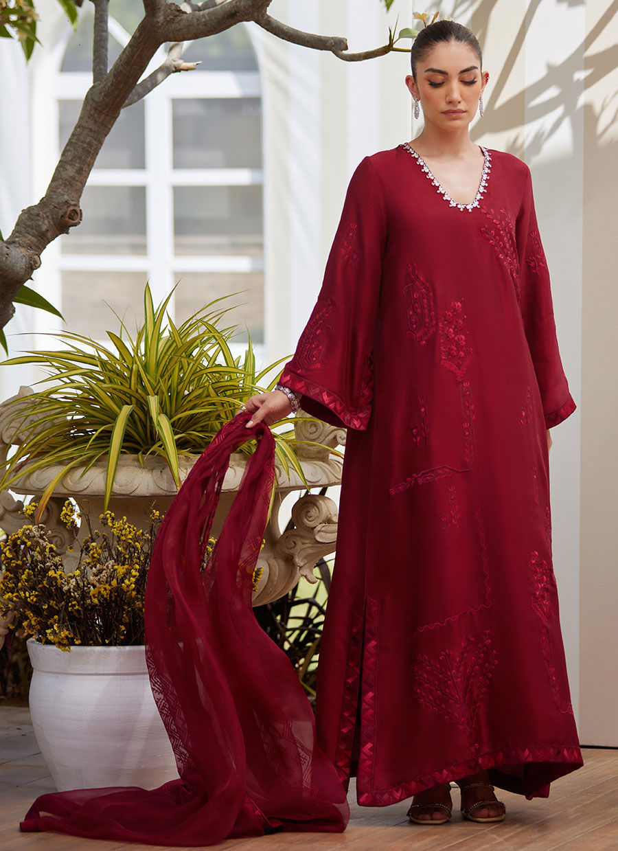 Model wearing scarlett red embroidered dress with matching dupatta from Farah Talib Aziz, perfect for Pakistani luxury pret in the UK.