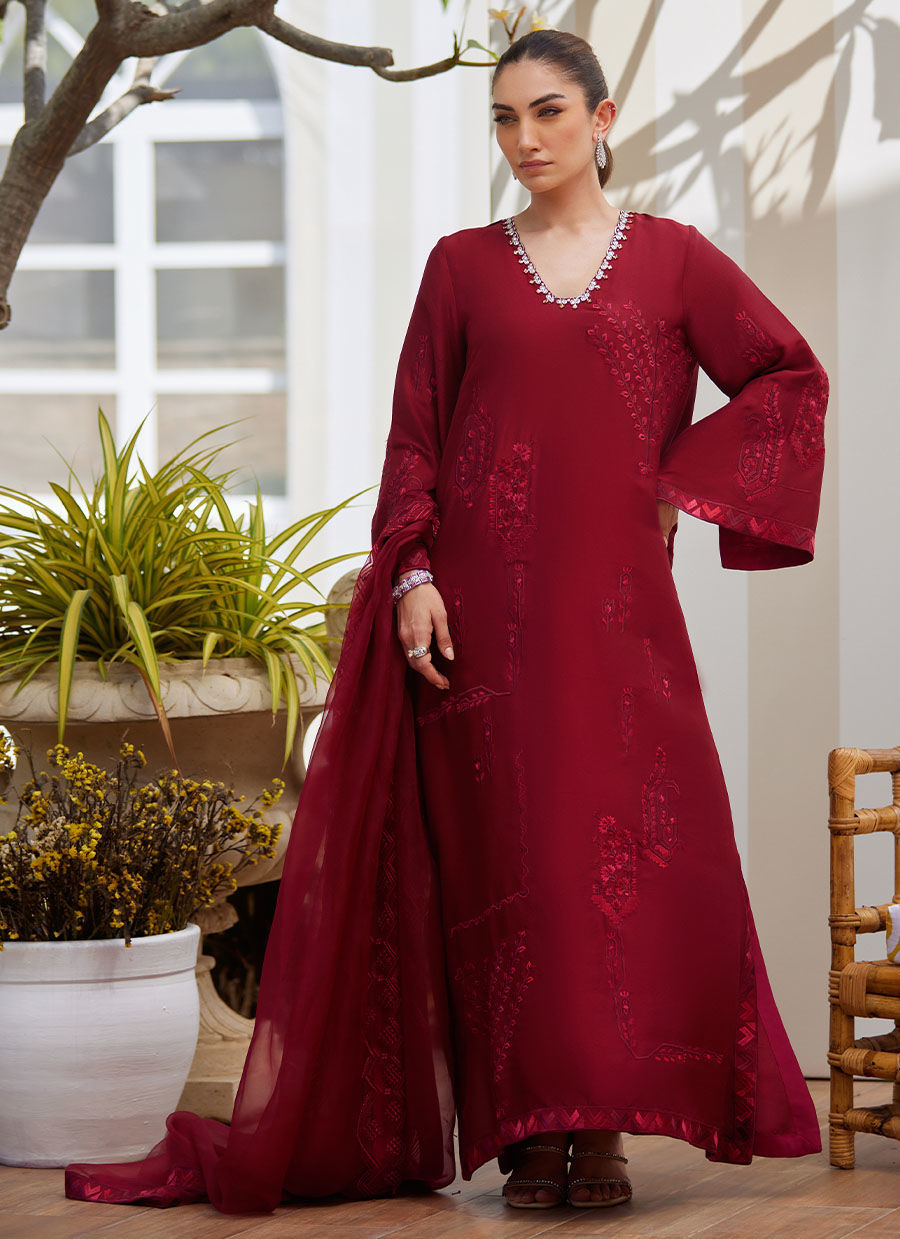 Model wearing scarlett red embroidered dress with matching dupatta from Farah Talib Aziz, perfect for Pakistani luxury pret in the UK.