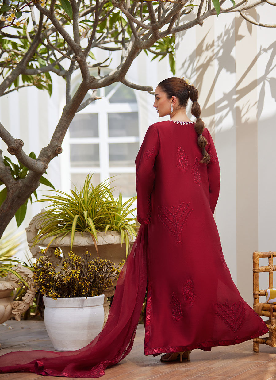 Model wearing scarlett red embroidered dress with matching dupatta from Farah Talib Aziz, perfect for Pakistani luxury pret in the UK.