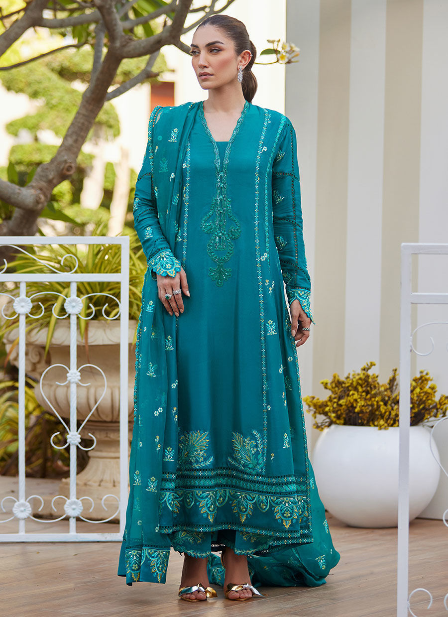 Model wearing emerald green embroidered outfit from Farah Talib Aziz, ideal for Pakistani luxury pret and Pakistani clothes online in UK.