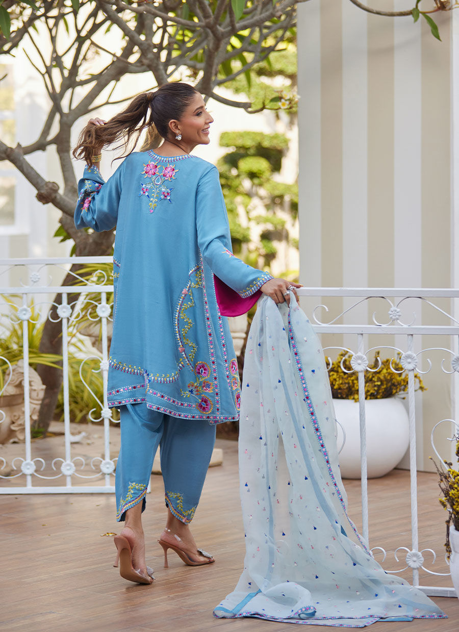 Model wearing sky blue embroidered outfit from Farah Talib Aziz, perfect for Pakistani luxury pret and Pakistani clothes online in UK.