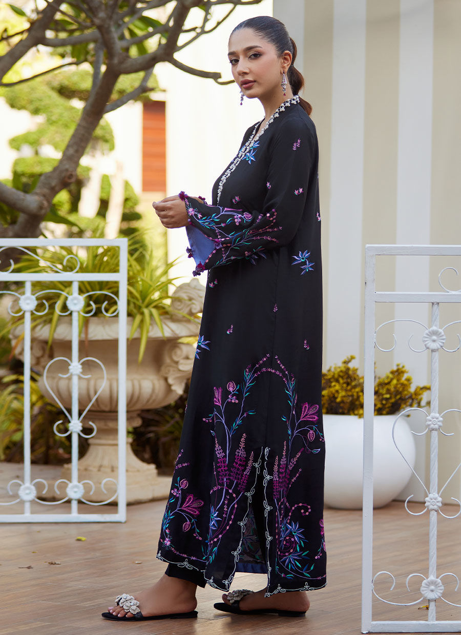 Model wearing black embroidered Zyla Midnight outfit from Farah Talib Aziz, perfect for Pakistani luxury pret and Pakistani clothes online in UK.