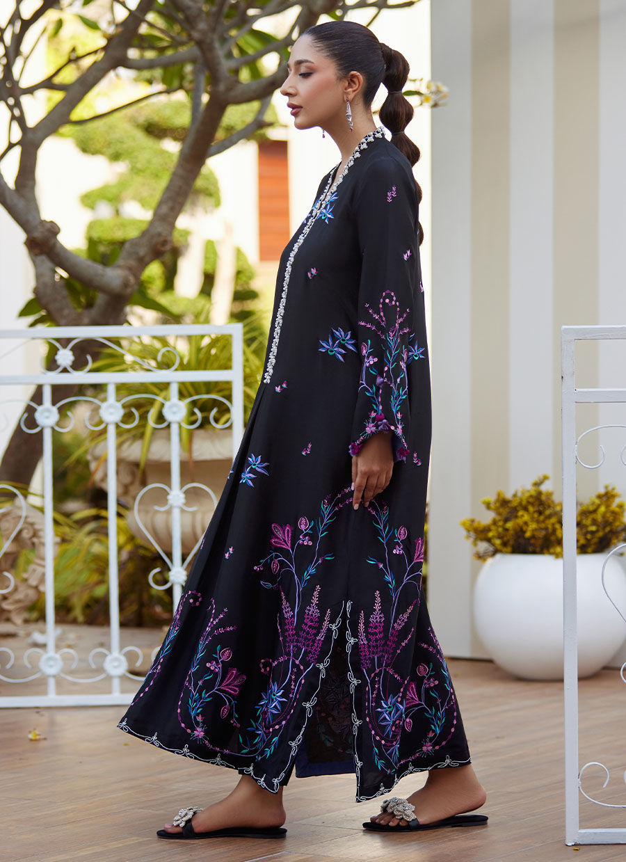 Model wearing black embroidered Zyla Midnight outfit from Farah Talib Aziz, perfect for Pakistani luxury pret and Pakistani clothes online in UK.