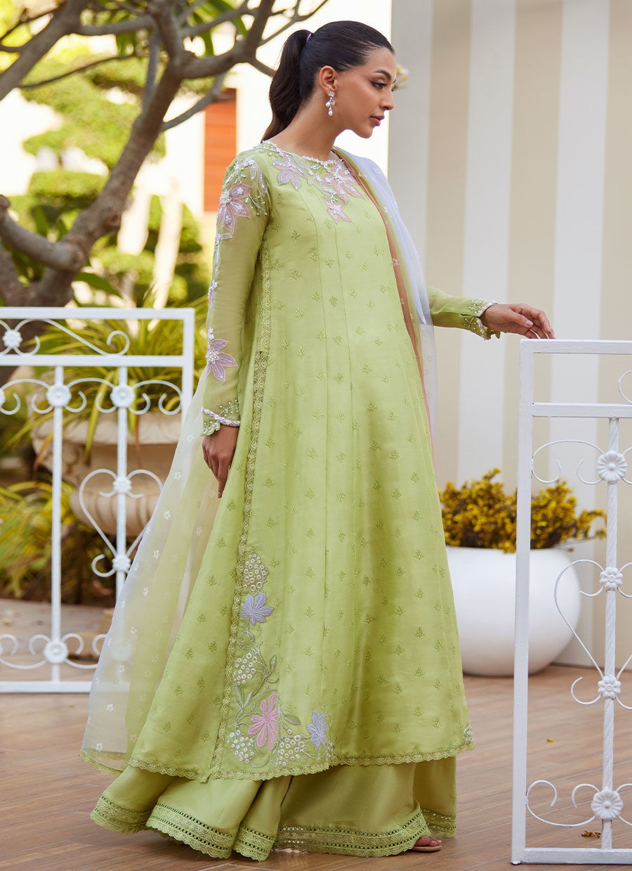 Model wearing apple green Talya outfit from Farah Talib Aziz, ideal for Pakistani luxury pret and Pakistani clothes online in UK.