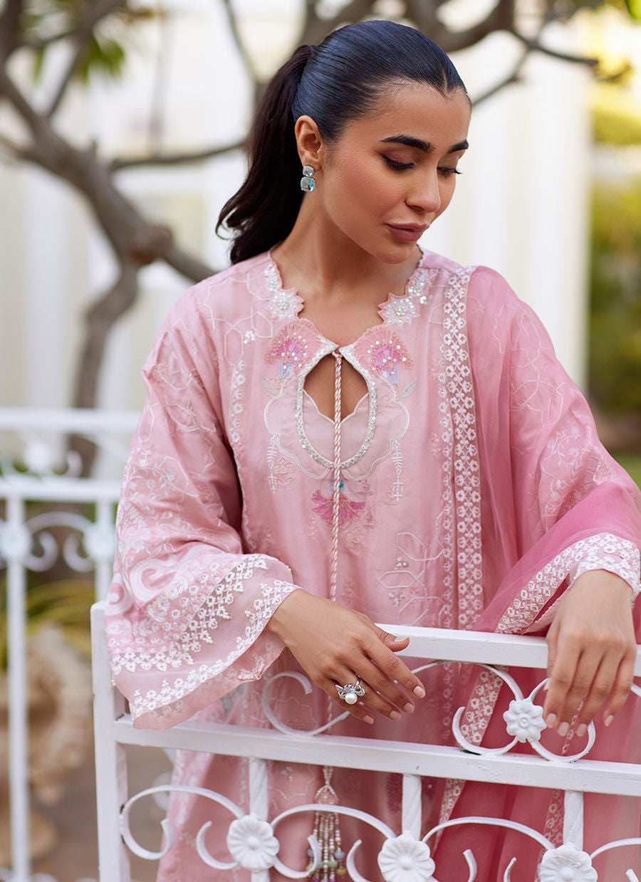 Model wearing tea pink Jovie outfit from Farah Talib Aziz, perfect for Pakistani luxury pret and Pakistani clothes online in UK.
