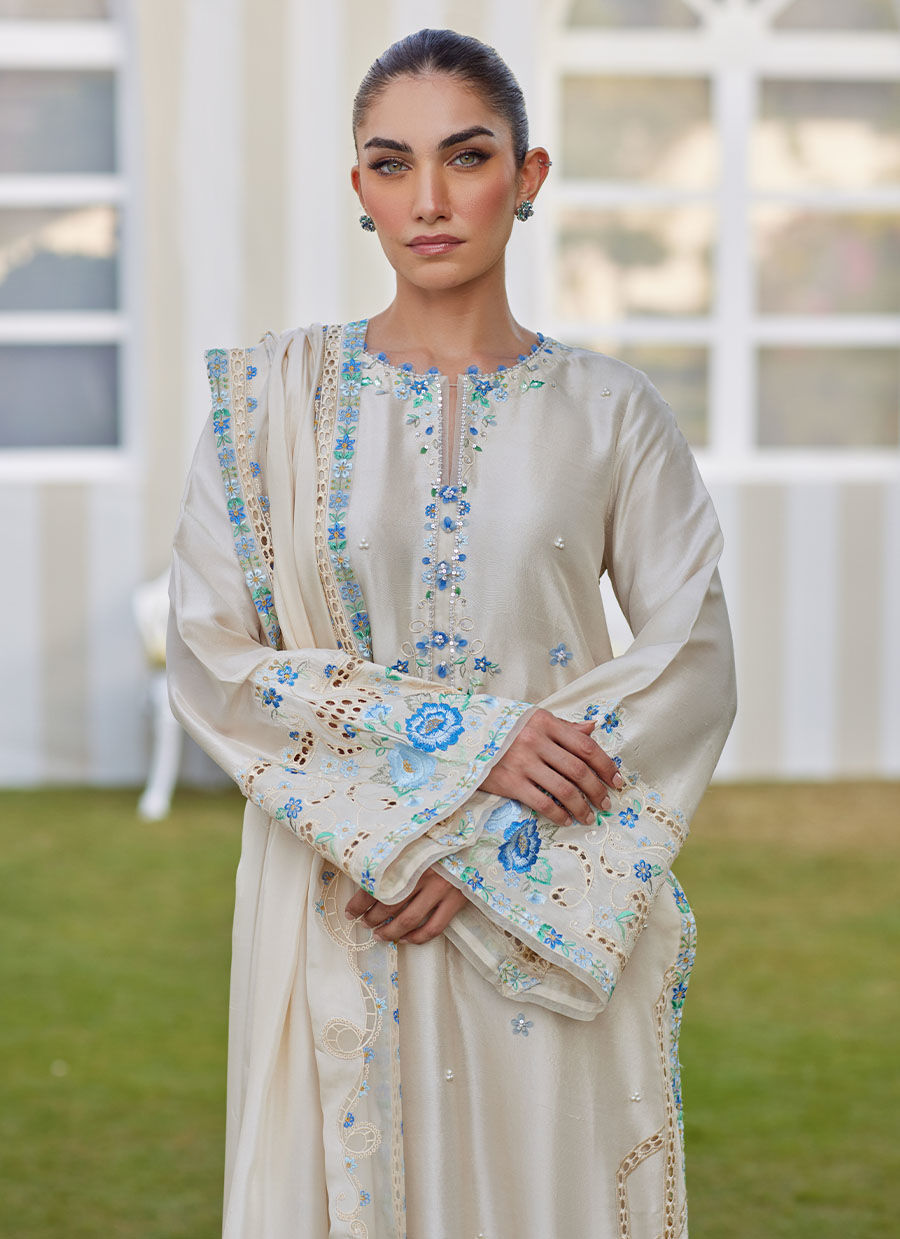 Model wearing ivory Delina outfit from Farah Talib Aziz, ideal for Pakistani luxury pret and Pakistani clothes online in UK.