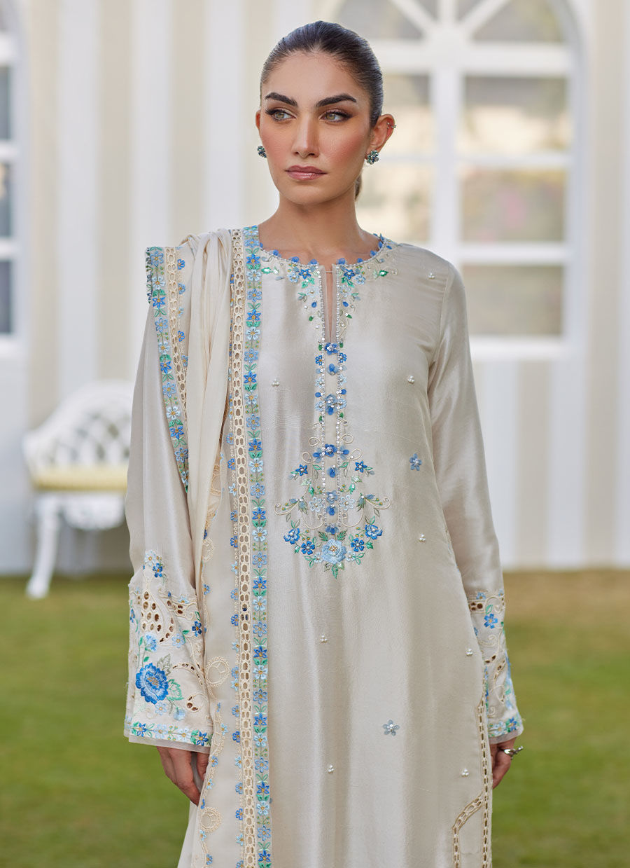 Model wearing ivory Delina outfit from Farah Talib Aziz, ideal for Pakistani luxury pret and Pakistani clothes online in UK.