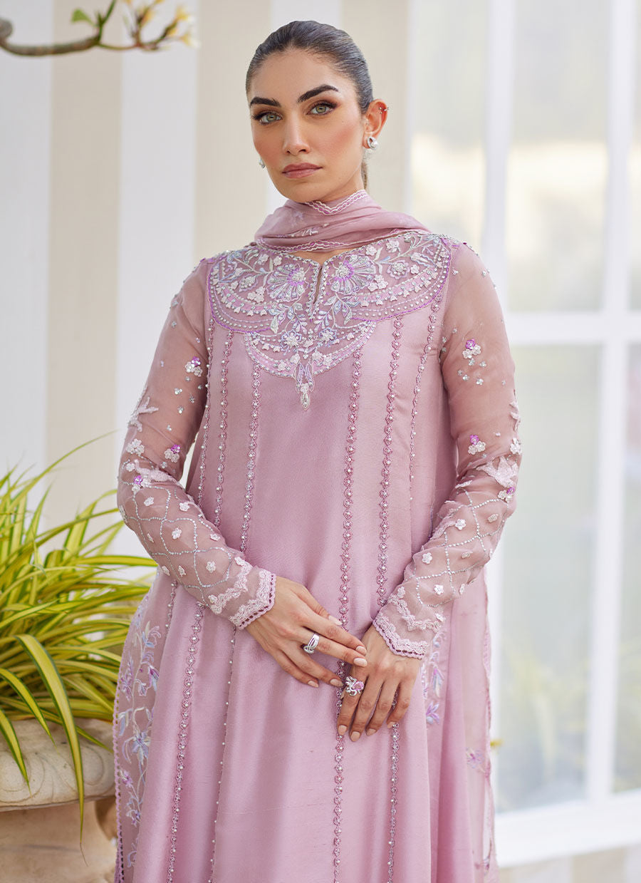 Model wearing mauve Karis dress from Farah Talib Aziz, ideal for Pakistani luxury pret and Pakistani clothes online in UK.