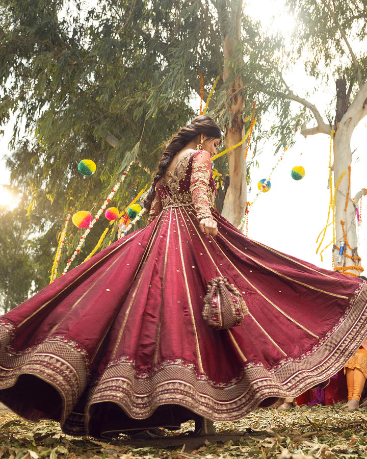 model wearing maroon dress by Faiza Saqlain, Pakistani luxury pret available online in UK for elegant festive wear