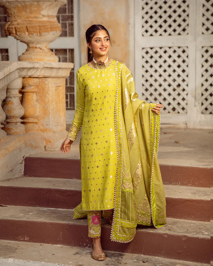 model wearing lime green dress by Faiza Saqlain, Pakistani luxury pret available online in UK for festive celebrations
