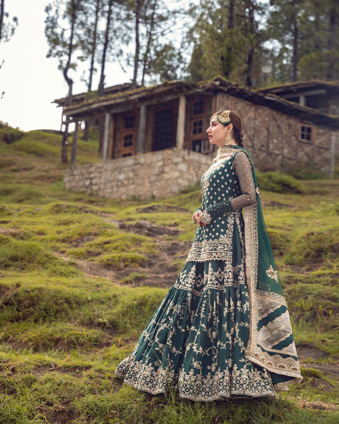 model wearing green dress by Faiza Saqlain, Pakistani luxury pret ideal for online shopping in the UK