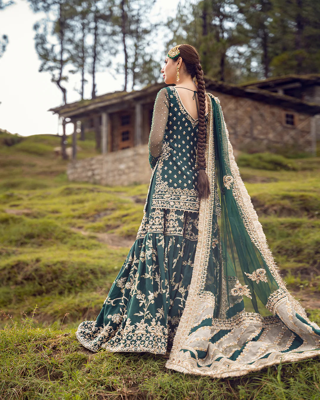 model wearing green dress by Faiza Saqlain, Pakistani luxury pret ideal for online shopping in the UK